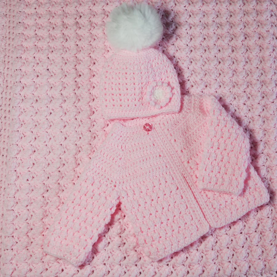 Bundle of Warmth: Cosy Pink Baby Blanket, Hat with Pom Pom, and Cardigan Set