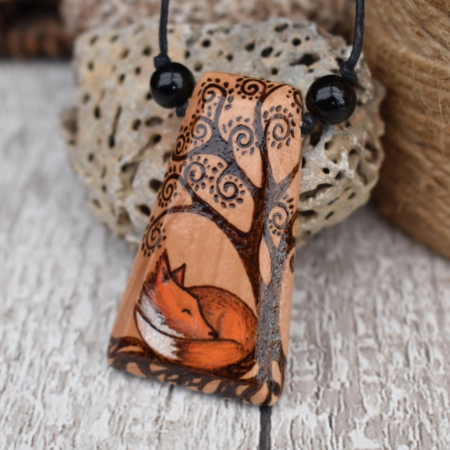 Sleepy fox by the tree. Pyrography British wildlife wood pendant. 