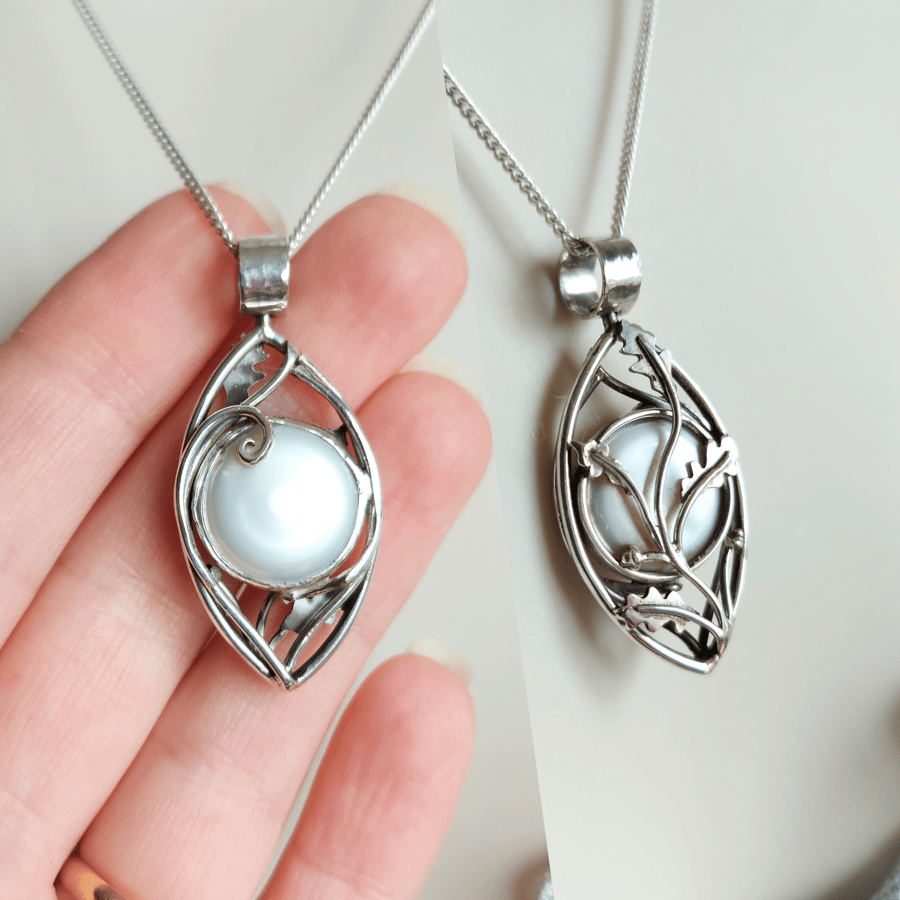 Unique Coin Pearl Double-Sided Rotating Pendant with Wave and Oak Branch Design