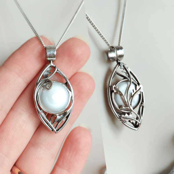 Unique Coin Pearl Double-Sided Rotating Pendant with Wave and Oak Branch Design