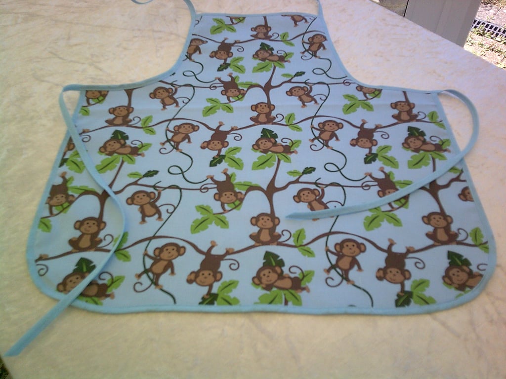 Monkeys Swinging in Trees Baby Apron