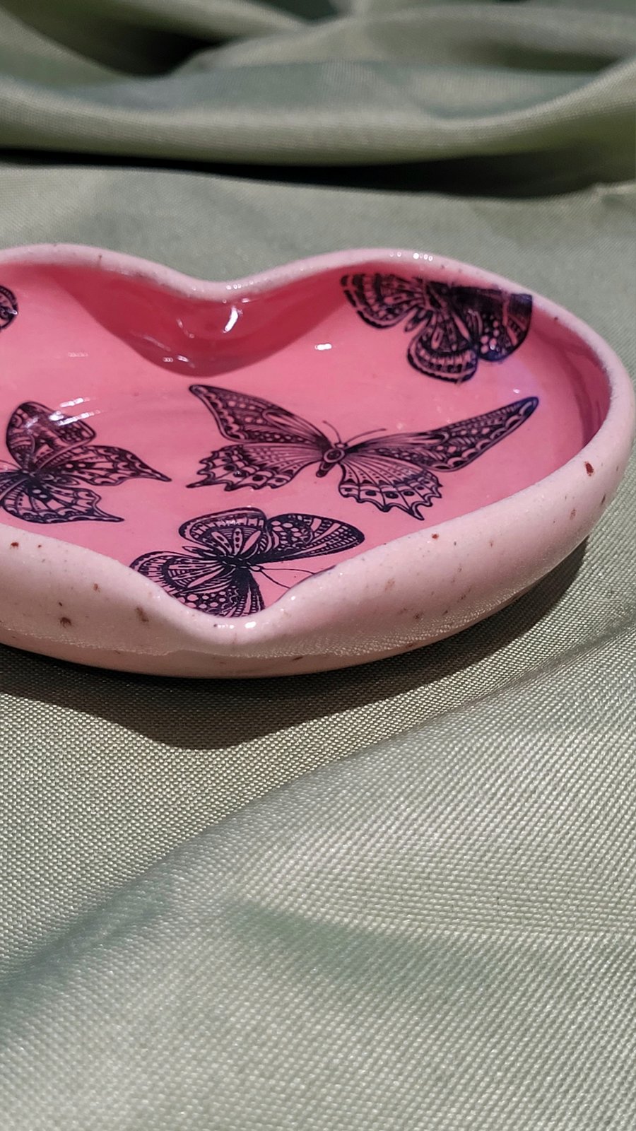 Heart shaped pink trinket dish with butterfly details handmade pottery