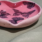 Heart shaped pink trinket dish with butterfly details handmade pottery