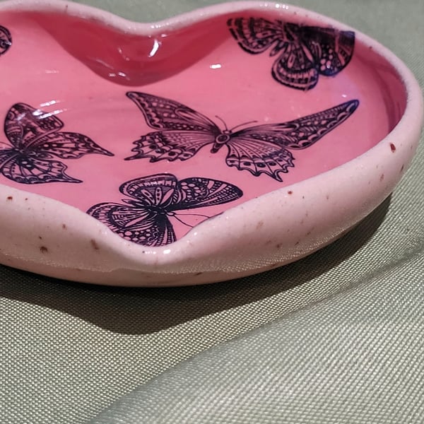 Heart shaped pink trinket dish with butterfly details handmade pottery