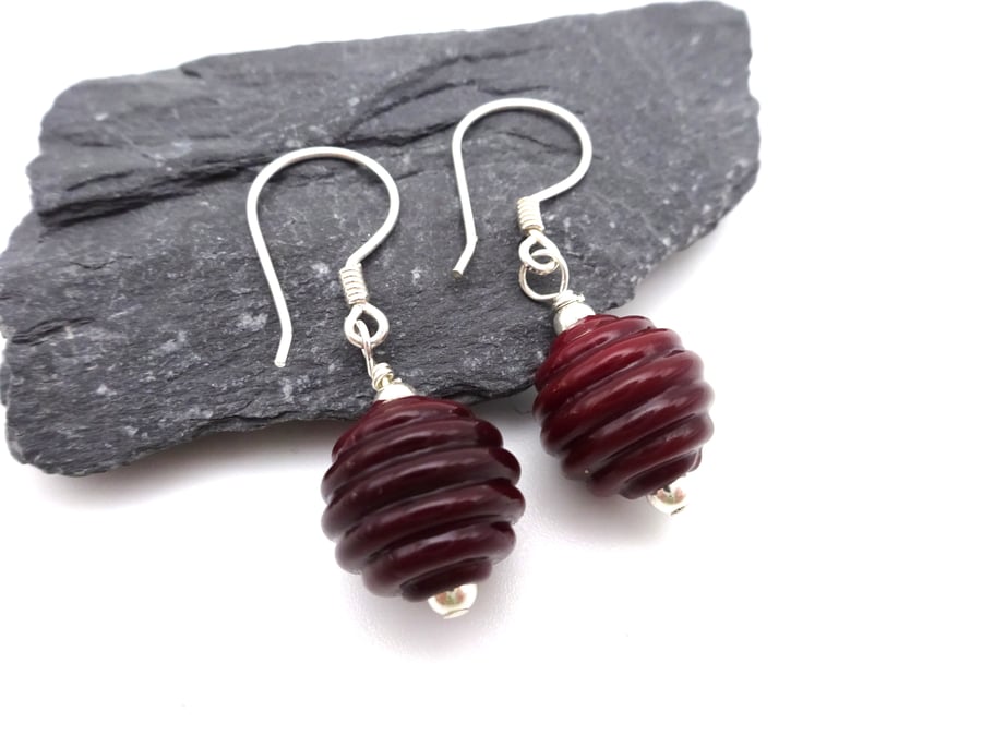 dark red lampwork glass ribbed earrings