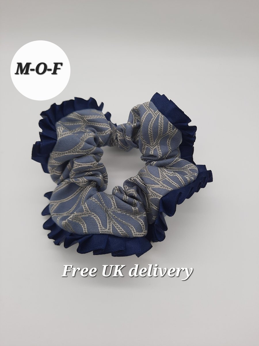 Blue hair scrunchie with navy pleated edging.  
