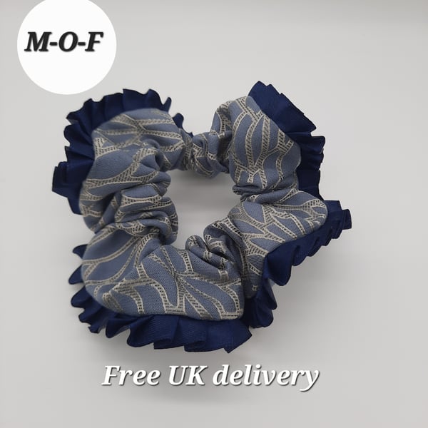 Blue hair scrunchie with navy pleated edging.  