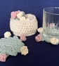 Set of four Rose flower drinking glass or mug coasters in a cream basket - Image 3