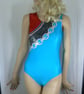 Turquoise gymnastic leotard featuring chain design - Image 1