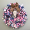 Rag wreath with wooden hearts