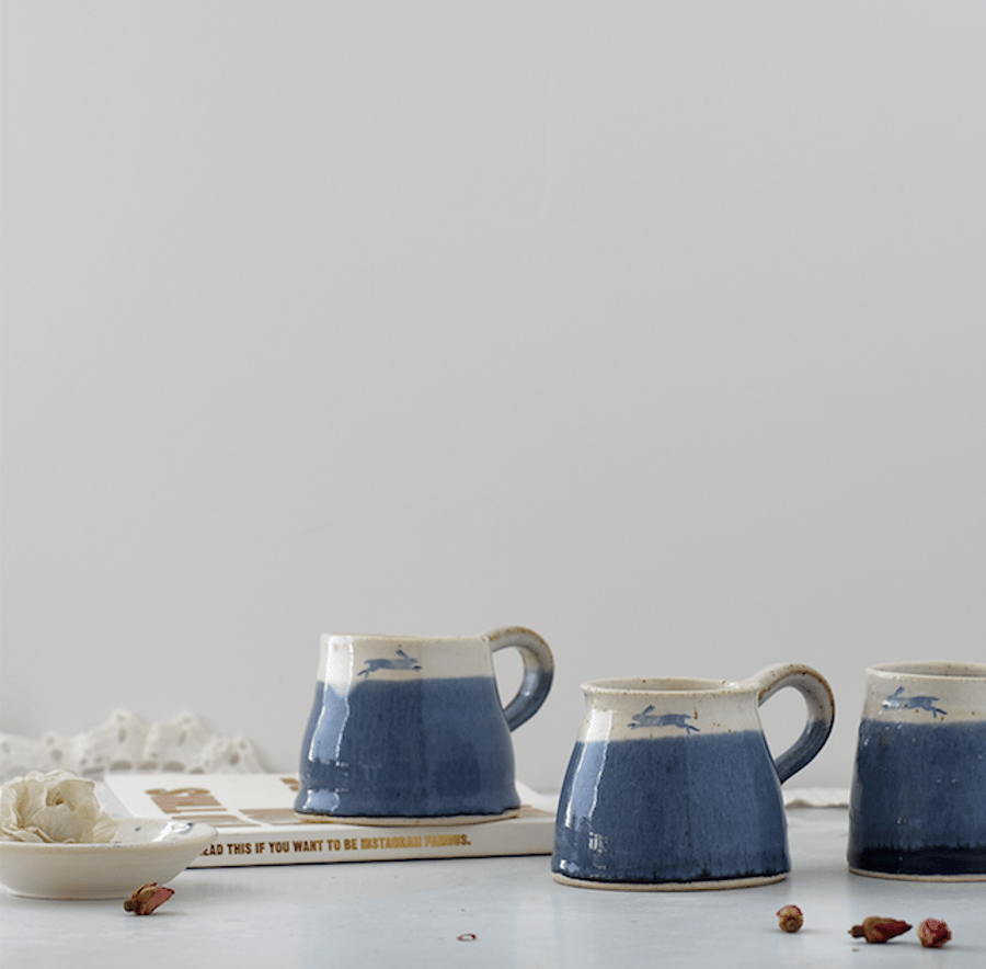 Handmade ceramic blue and white leaping hare mug - stoneware pottery