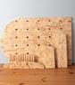 Table Top OSB Pegboard with a Curved Top, includes Feet, Shelving and Pegs - Image 7
