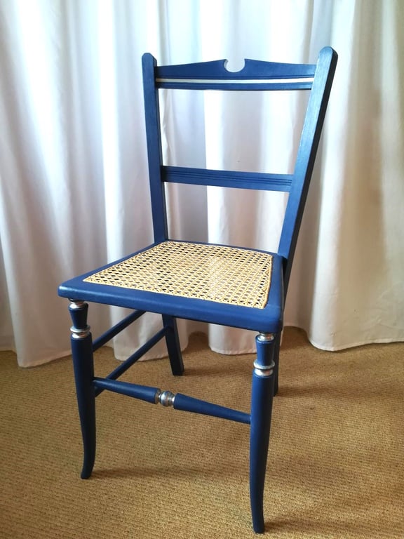 Antique chair upcycled in blue chalk paint, re-caned seat