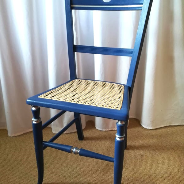 Antique chair upcycled in blue chalk paint, re-caned seat