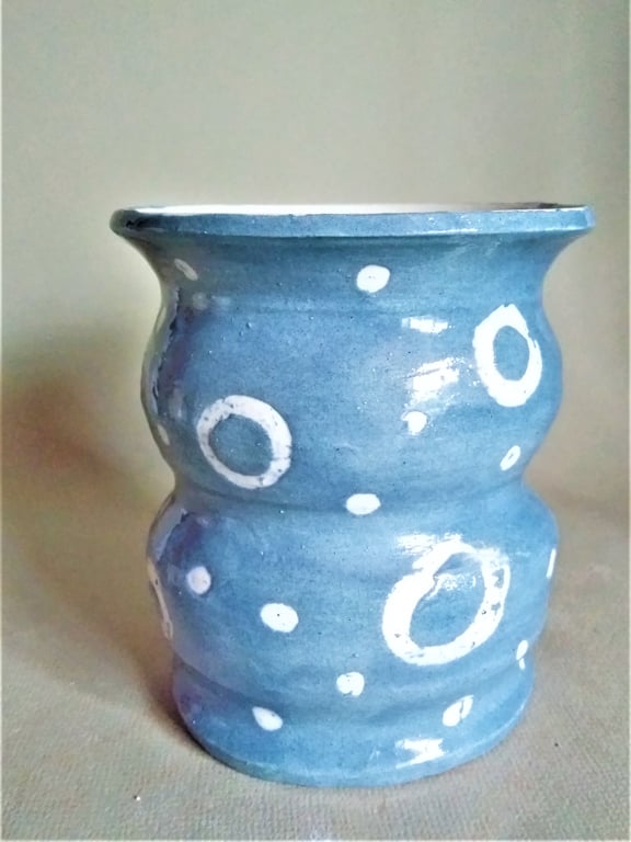 Ceramic Bellied Blue Vase: White Motif Ceramic Vase.