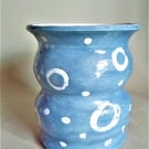 Ceramic Bellied Blue Vase: White Motif Ceramic Vase.