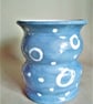 Ceramic Bellied Blue Vase: White Motif Ceramic Vase.