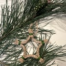 Jute star decoration with green accent 
