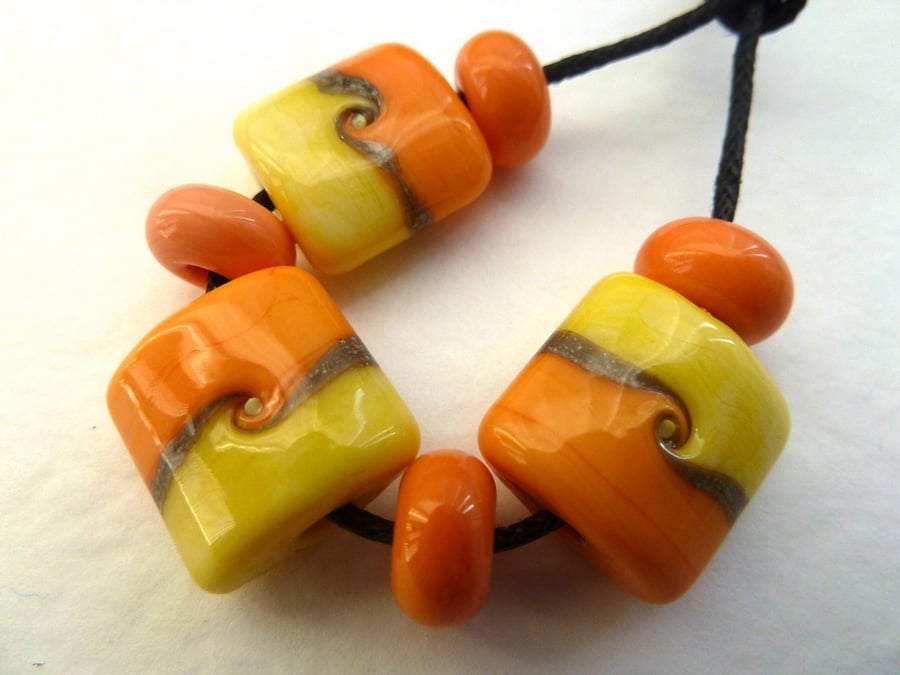 orange and lemon lampwork beads