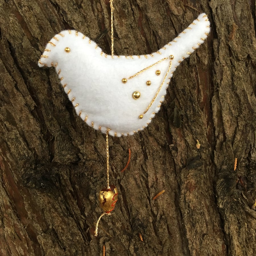 White felt bird, peace dove, hanging decoration, with gold accents