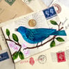 Ink and pen painting on vintage used envelope, bird and blossom artwork