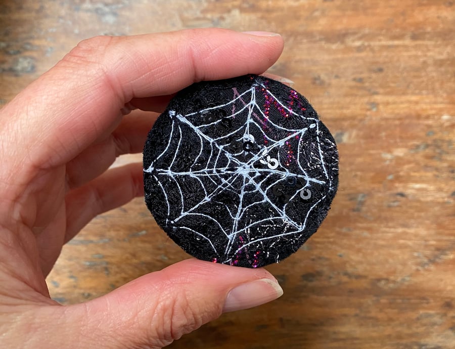 Up-cycled embroidered spiders web brooch pin or badge. 