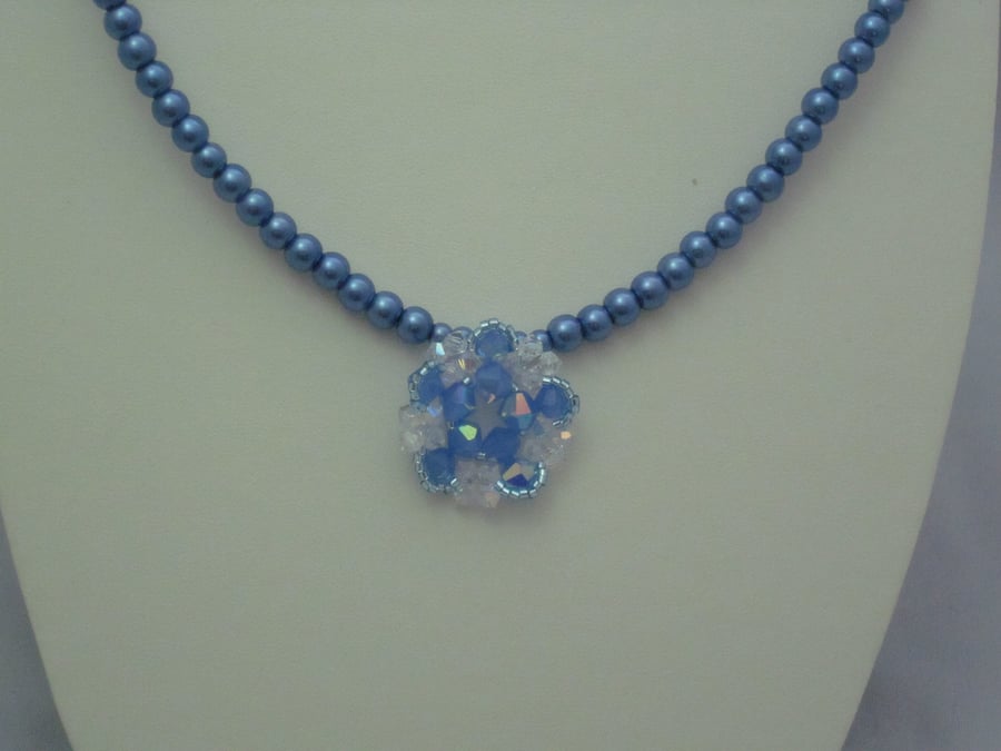 Blue glass pearl necklace with crystal flower pendant (327)