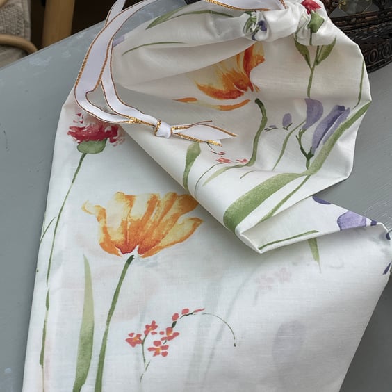 Fabric wine bottle gift bag with ribbon tie