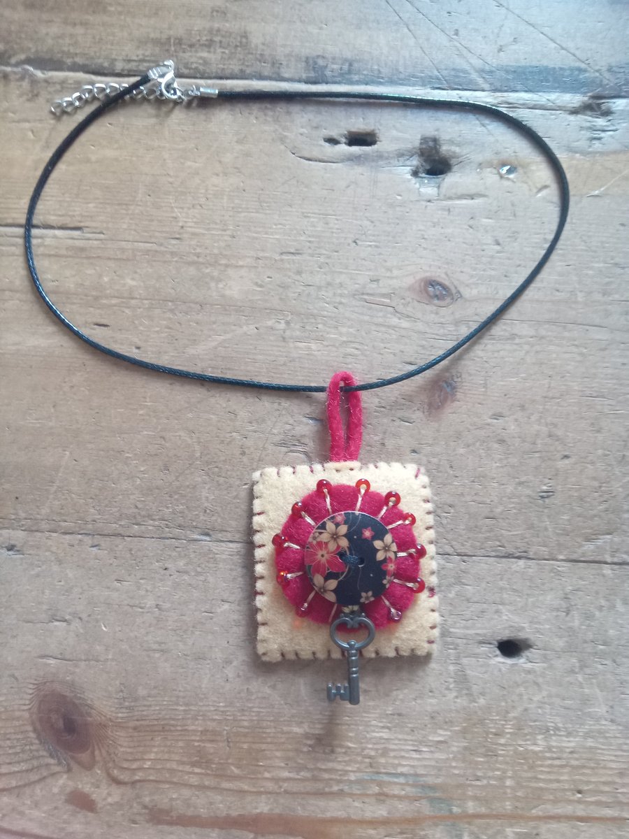 Felt button necklace. 