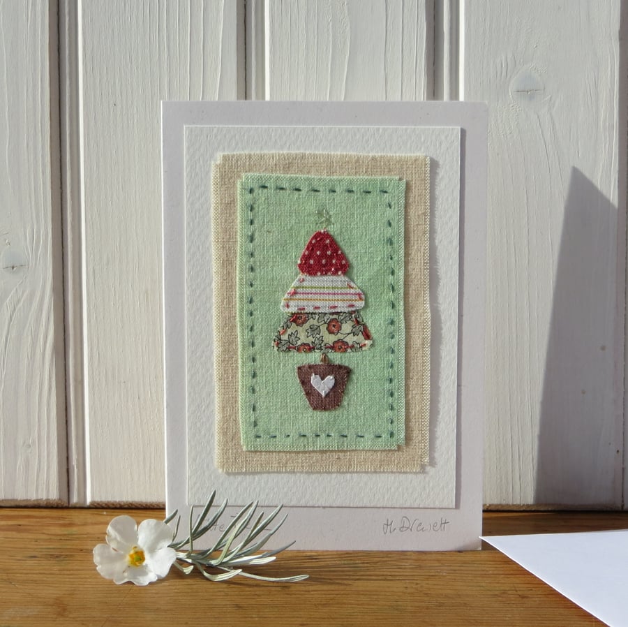 Little Tree, hand-stitched miniature textile on card with silver star at the top