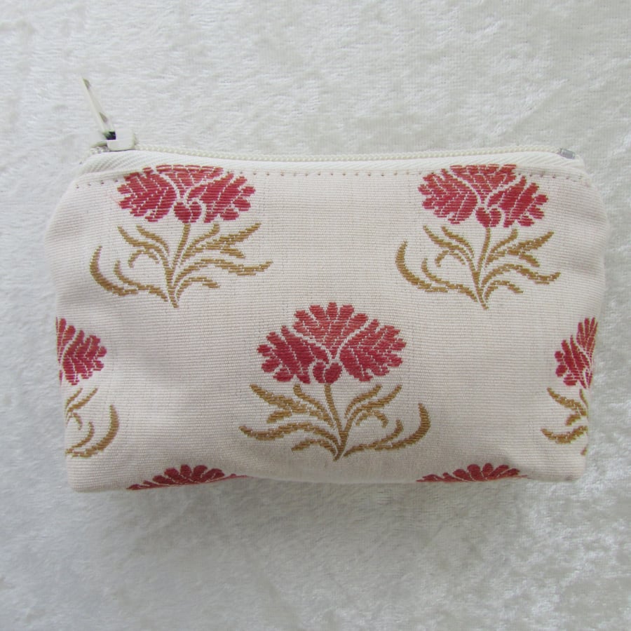 Small purse in cream and red floral fabric
