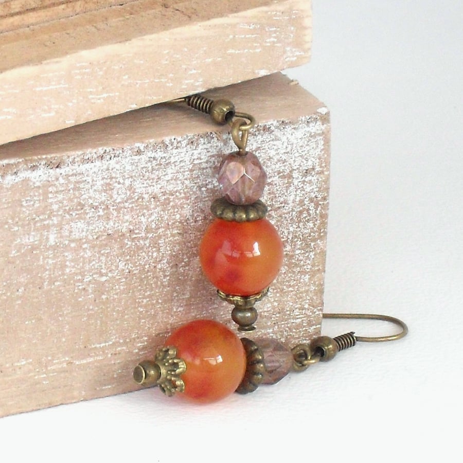 Handmade bronze earrings, with orange kunzite and crystal