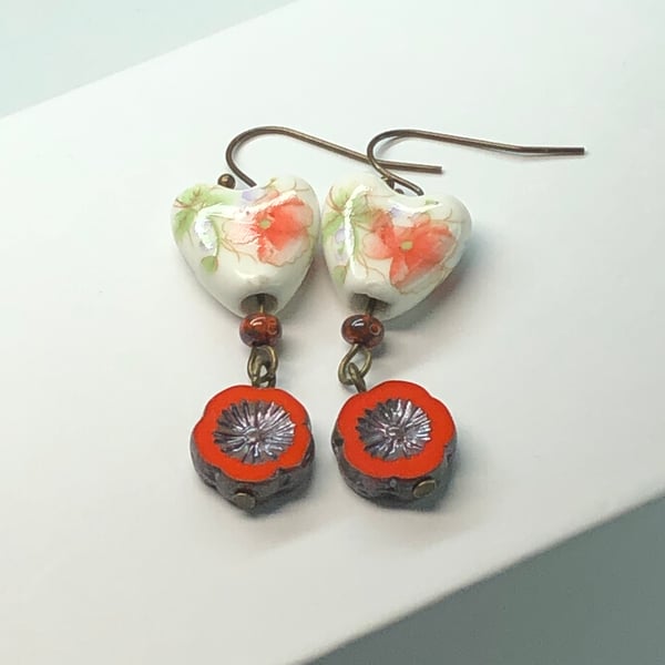 Orange floral ceramic heart earrings