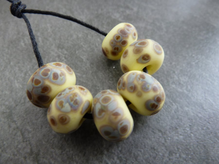 yellow raku tumbled lampwork glass beads