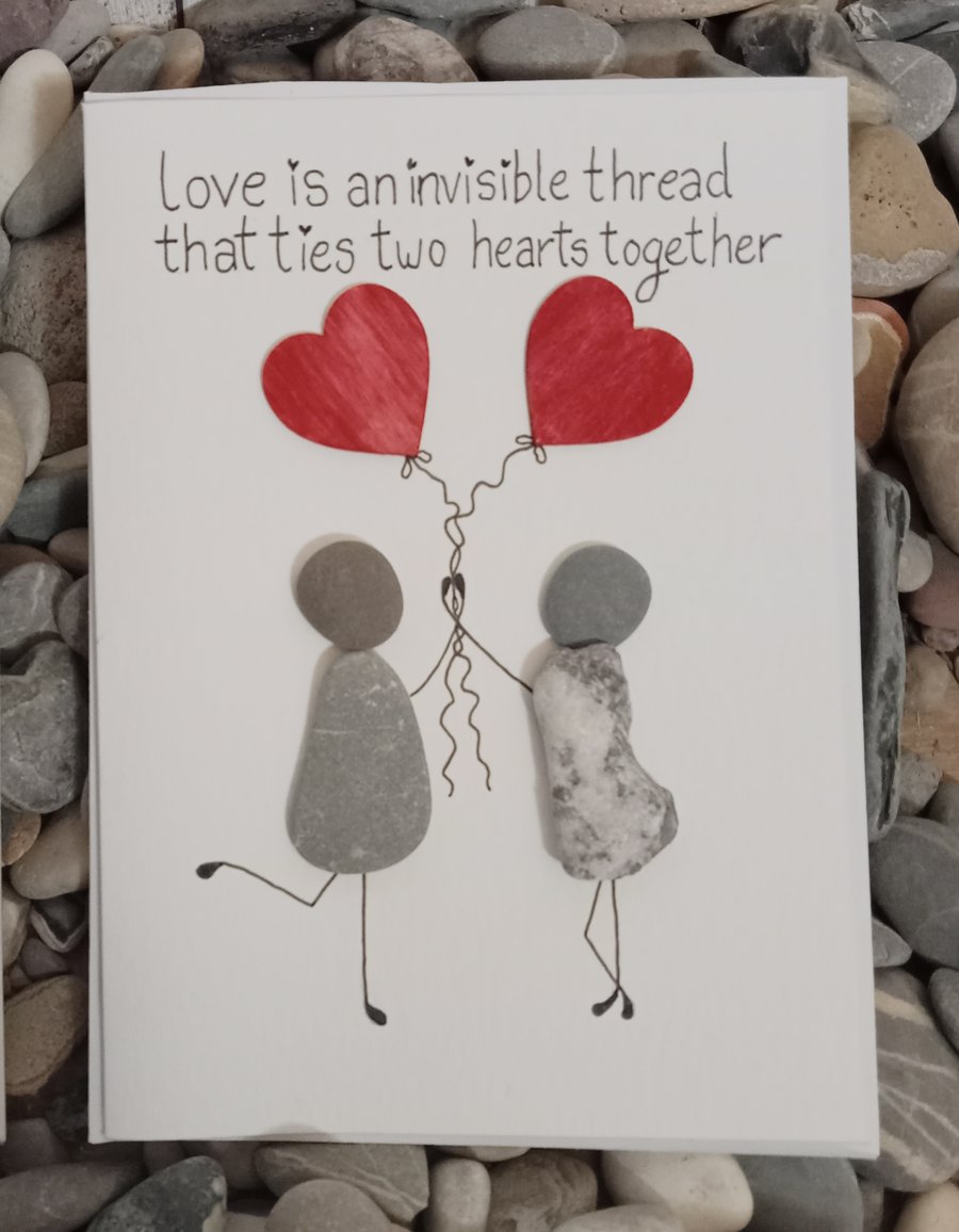 Love is an invisible thread that ties two hearts together, Valentines card