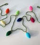 Crocheted Rainbow Bulb Garland - Image 1