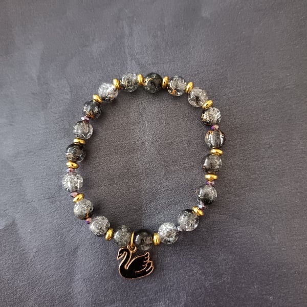 Elasticated beaded black swan charm bracelet 