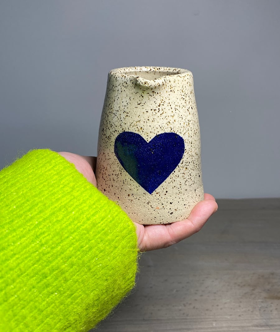 Navy blue love heart ceramic pourer.