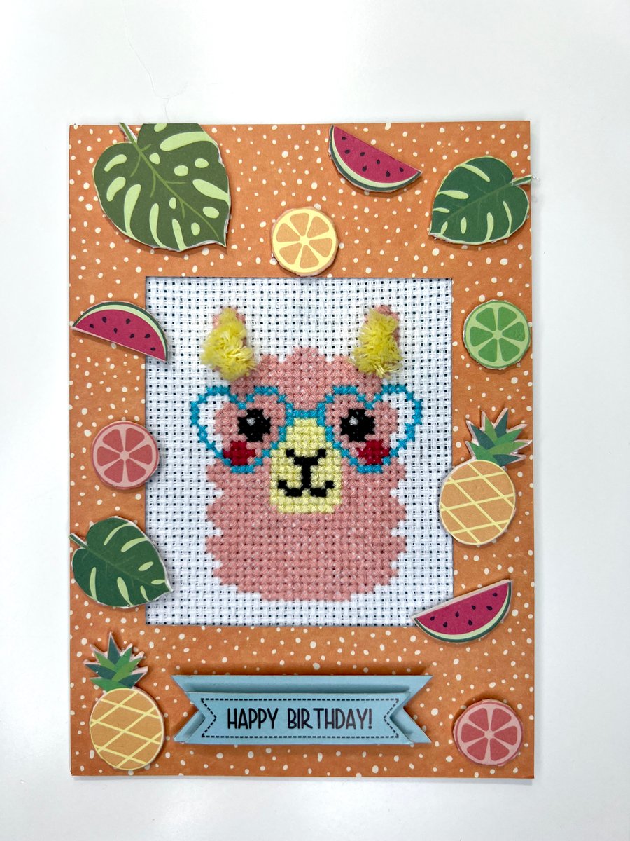 Orange lama or alpaca with blue glasses