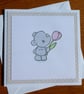 Rhino Holding A Tulip Blank Card