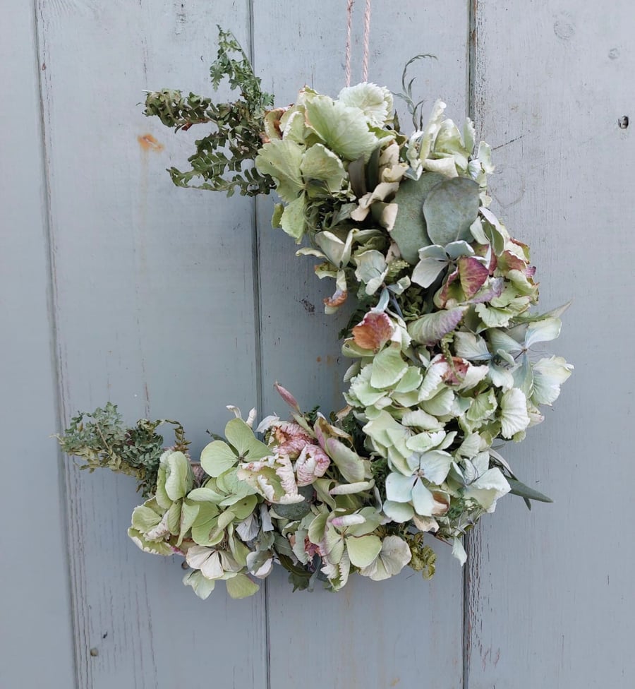 Dried Hydrangea Crescent Moon Shape Wreath. Shades of Pale Green and Blue.
