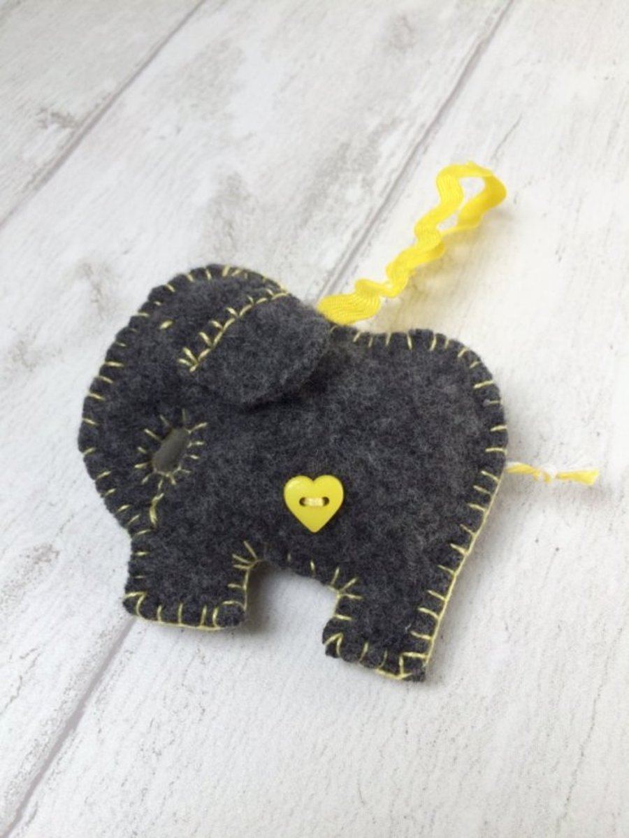 Elephant - Felted wool hanging decoration, with yellow heart