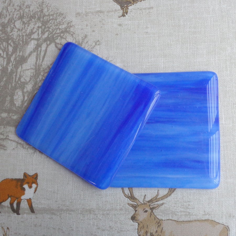 Fused glass coasters, matching pair in wispy bright blue