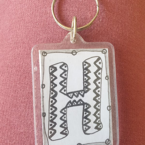 Hand drawn initial "H" keyring.