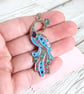 Sky blue peacock pendant with rose gold, turquoise and purple accents - Image 1