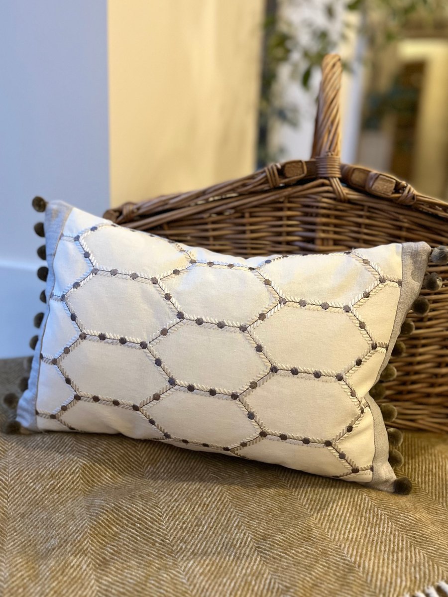 Embroidered cotton and reclaimed linen rectangular cushion cover with pompoms