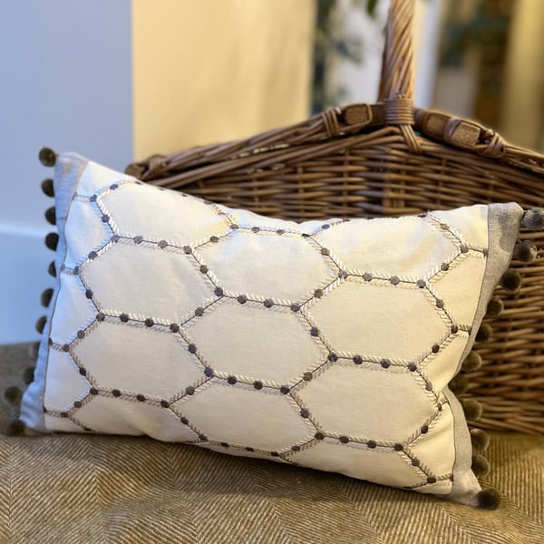 Embroidered cotton and reclaimed linen rectangular cushion cover with pompoms