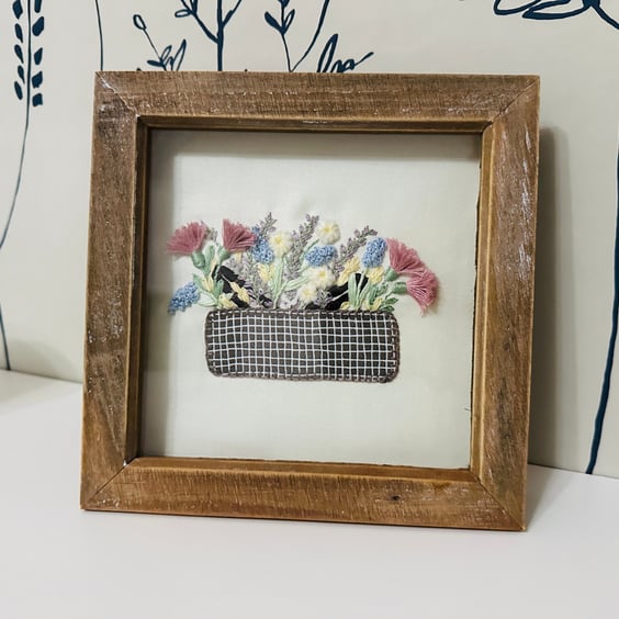  Hand embroidery picture of an appliqué picnic basket overflowing with flowers
