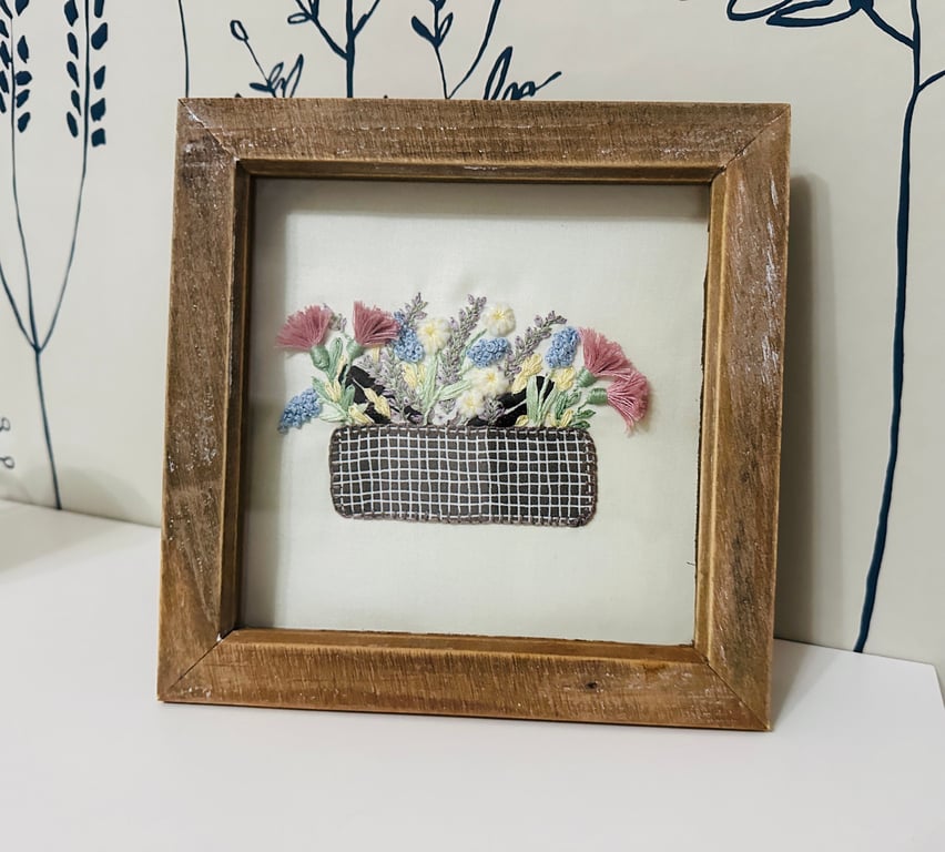  Hand embroidery picture of an appliqué picnic basket overflowing with flowers