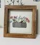  Hand embroidery picture of an appliqué picnic basket overflowing with flowers - Image 1